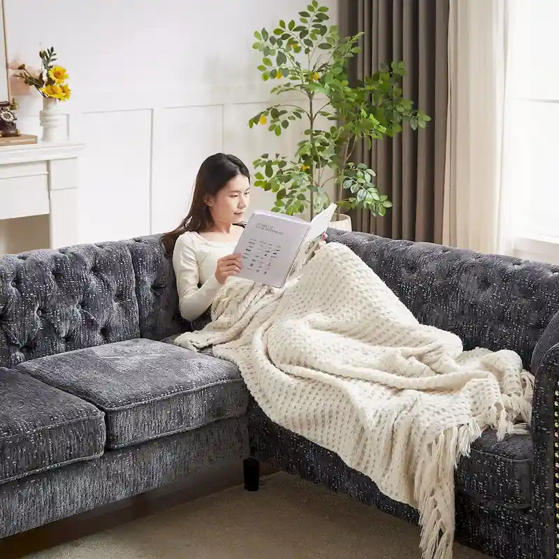 81.5 Ecksofa in L-Form aus Chenille mit gesteppter Rückenlehne