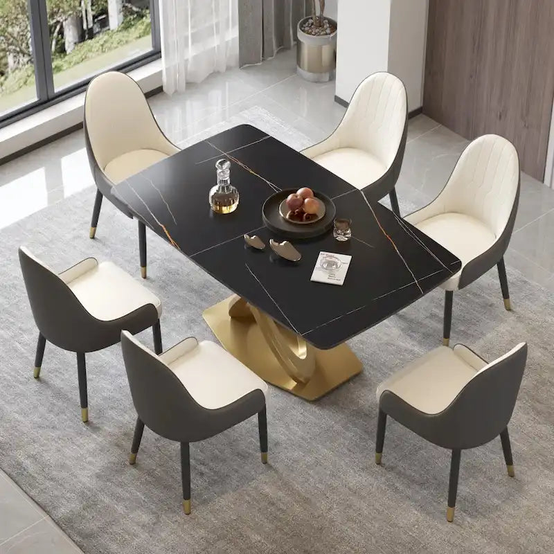 Table de salle à manger contemporaine en marbre avec piètement géométrique doré