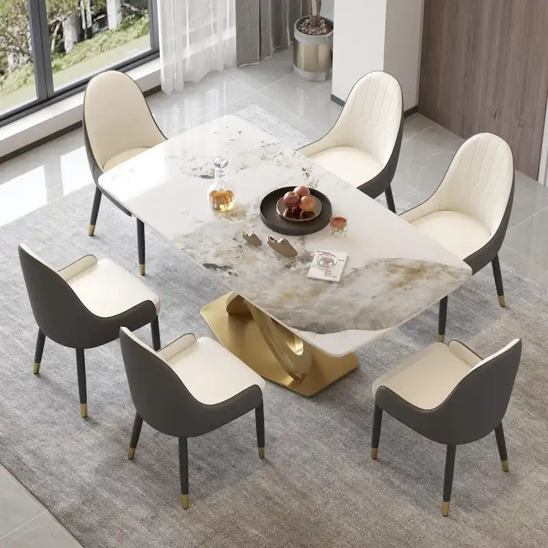 Table de salle à manger contemporaine en marbre avec piètement géométrique doré
