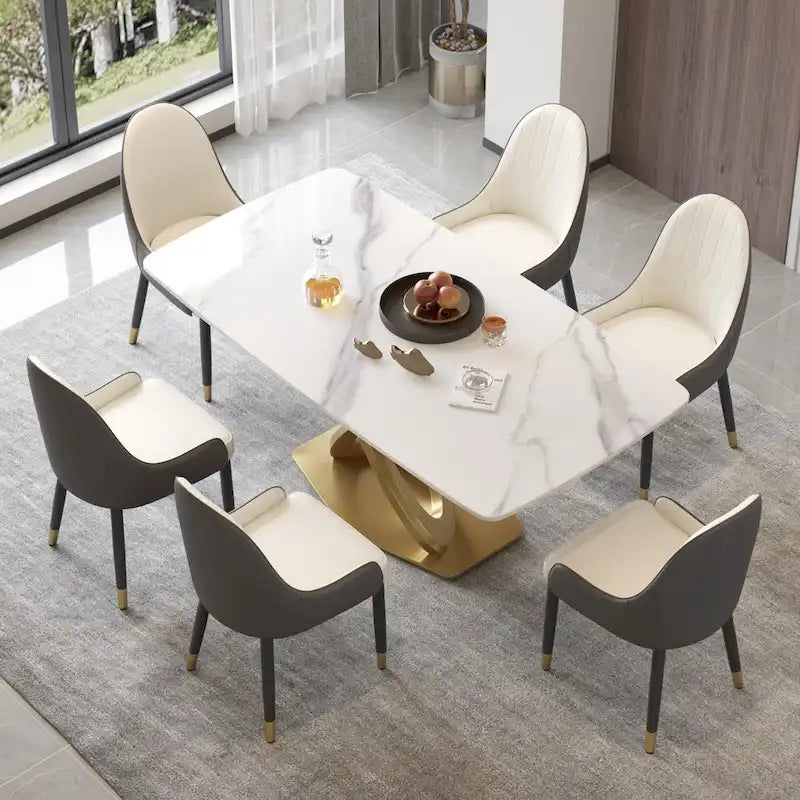 Table de salle à manger contemporaine en marbre avec piètement géométrique doré