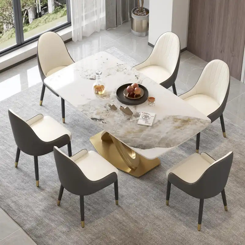 Table de salle à manger contemporaine en marbre avec piètement géométrique doré