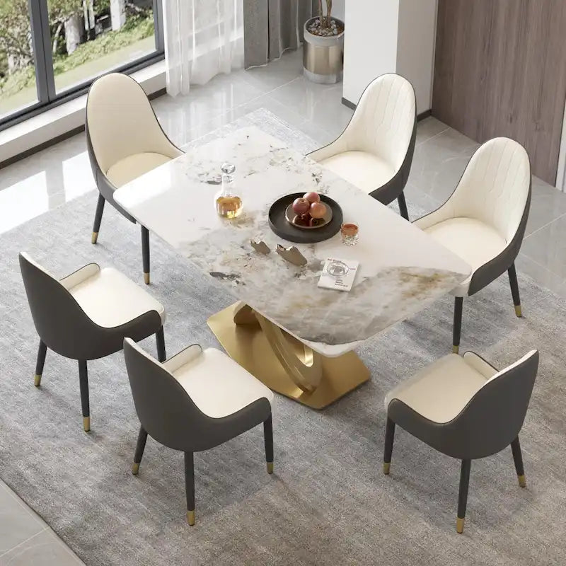 Table de salle à manger contemporaine en marbre avec piètement géométrique doré