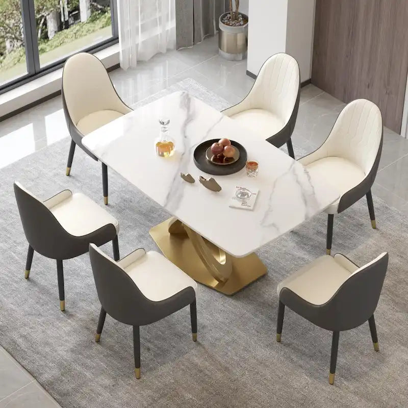 Table de salle à manger contemporaine en marbre avec piètement géométrique doré