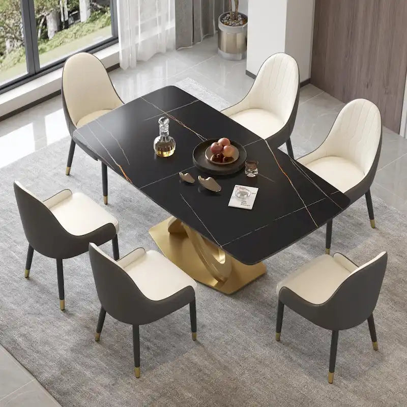 Table de salle à manger contemporaine en marbre avec piètement géométrique doré