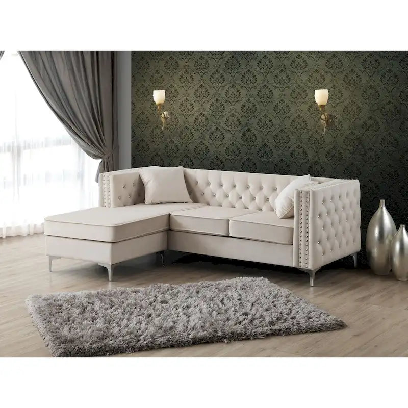 Samtsofa mit Knopfheftung und Chaiselongue